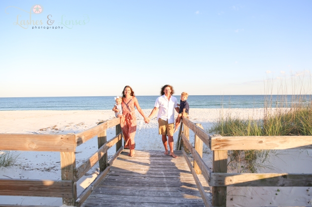 Family on boardwalk at Johnsons Beach Perdido Key