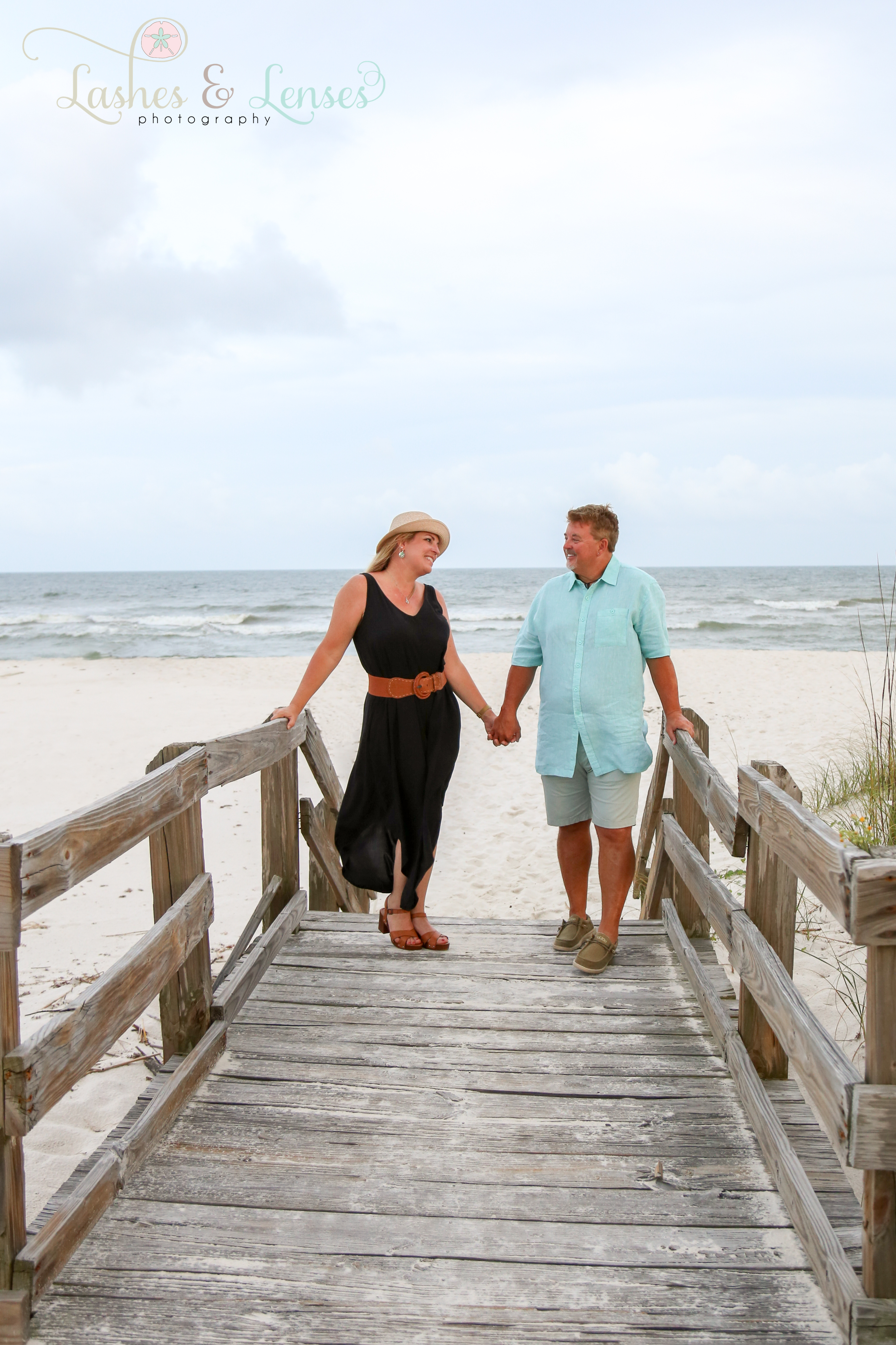 Husband and Wife on boardwalk at Johnsons Beach Perdido Key